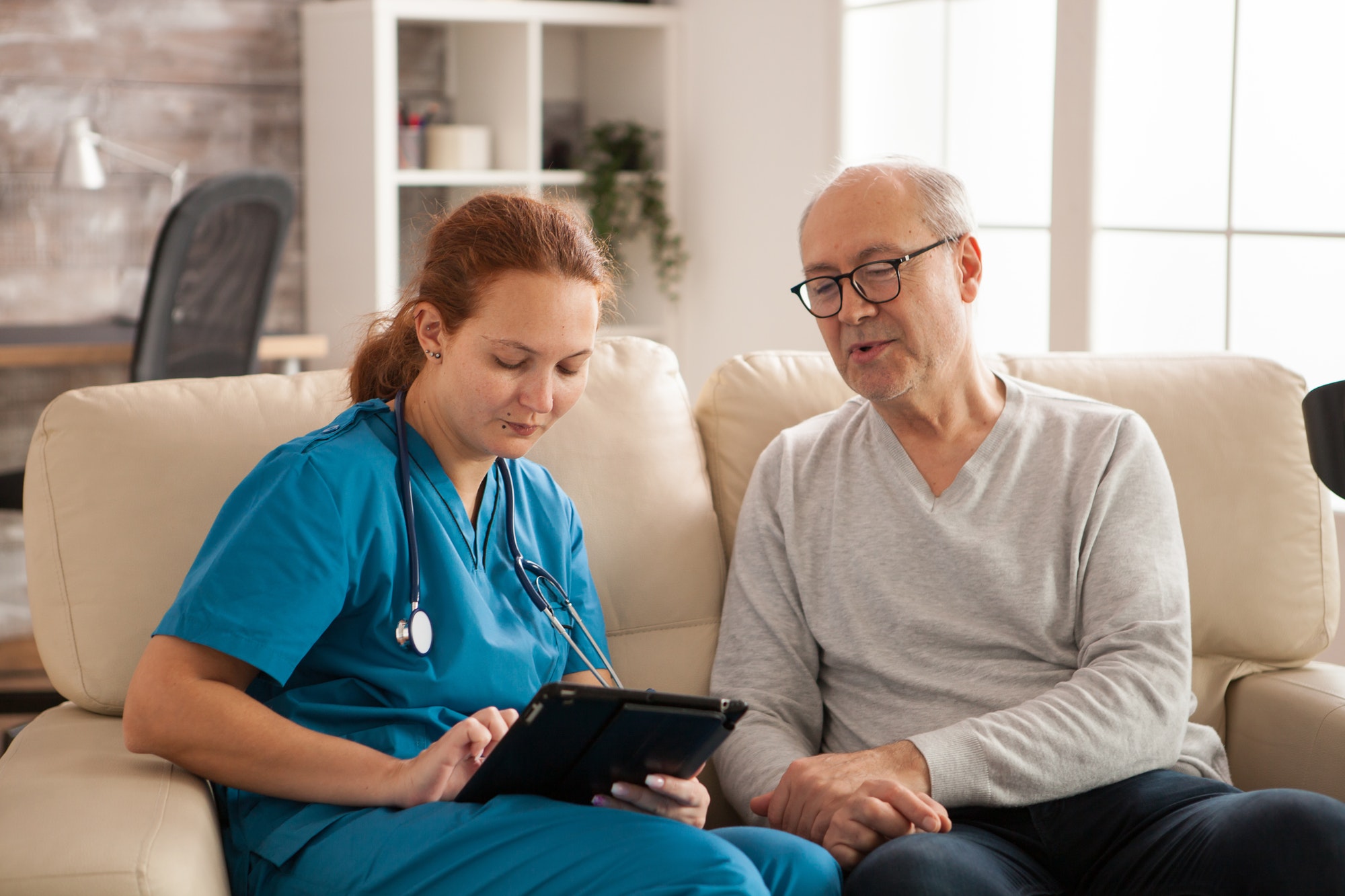 Support worker assisting client